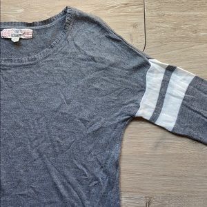 Grey sweater with striped details